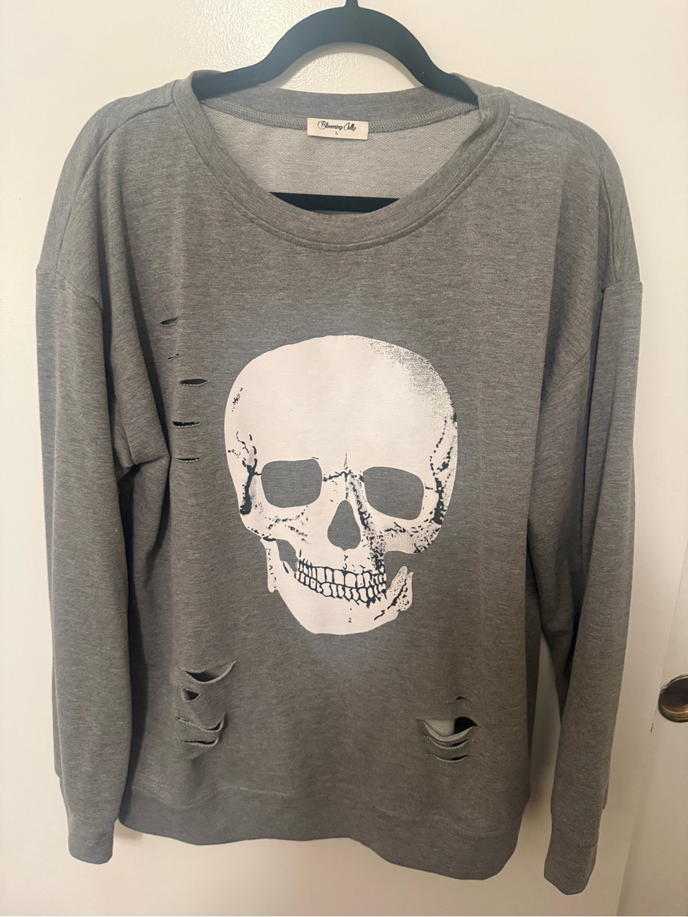Woman’s Grey Crewneck Skull Graphic Sweater